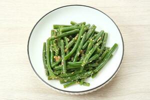 Tumis Buncis or Stir Fry String Bean with garlic and chilli powder photo