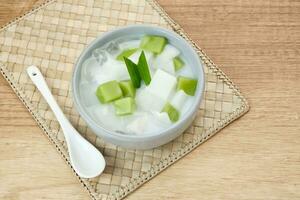 Pandan Coconut Dessert, made from jelly, nata de coco, pandan leaf and coconut. Indonesian dessert photo