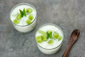 Pandan Coconut Dessert, made from jelly, nata de coco, pandan leaf and coconut. Indonesian dessert photo