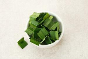 Slice of fresh green pandan leaves, Pandanus amaryllifolius photo