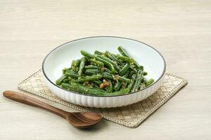 Tumis Buncis or Stir Fry String Bean with garlic and chilli powder photo