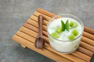 Pandan Coconut Dessert, made from jelly, nata de coco, pandan leaf and coconut. Indonesian dessert photo