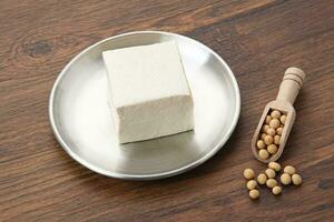 Tahu or Tofu, one of raw ingredient food made from fermented soybean extract. photo