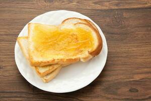 Roti Bakar Selai Srikaya, toasted brioche loaf with kaya jam photo