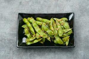 Stir Fry Edamame with garlic and chilli powder photo