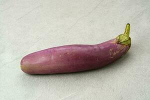 Fresh organic eggplant on the table, close up photo