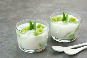 Pandan Coconut Dessert, made from jelly, nata de coco, pandan leaf and coconut. Indonesian dessert photo