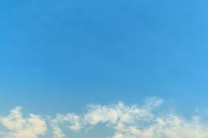 White cloud and blue sky background with copy space photo