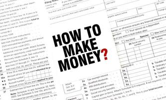 HOW TO MAKE MONEY on white sticker with documents photo