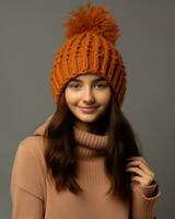 a beautiful young woman wearing an orange knit hat with a pom pom generative ai photo