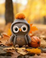 a crocheted owl sits on the ground next to a basketball generative ai photo