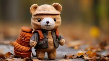 a crocheted teddy bear wearing a backpack and hat generative ai photo