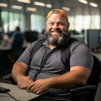 a man with a beard sitting at a desk in an office generative ai photo