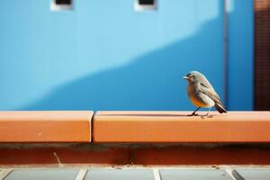 a small bird is standing on a ledge generative ai photo