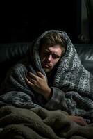 a man is wrapped in a blanket on a couch generative ai photo