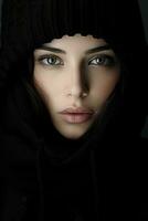 a woman in a black hoodie and scarf generative ai photo