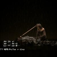 an image of a woman in the rain with a stick generative ai photo