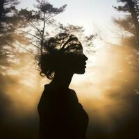 the silhouette of a woman in a forest at sunset generative ai photo