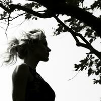 a black and white photo of a woman standing in front of a tree generative ai