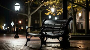 a black bench sitting on a brick walkway at night generative ai photo