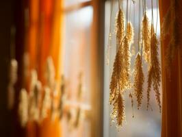 a bunch of dried wheat is hanging from a window generative ai photo