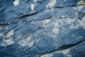 un cerca arriba de un azul rock con grietas en eso generativo ai foto