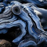 a close up of a tree trunk with blue paint on it generative ai photo
