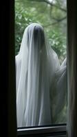 a person in a white sheet looking out a window generative ai photo