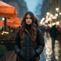 un mujer en un negro y naranja chaqueta en pie en el medio de un ciudad calle generativo ai foto