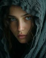 a woman in a hooded robe with green eyes generative ai photo