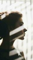 a woman is silhouetted against a window with blinds generative ai photo