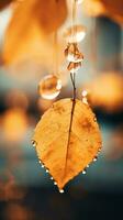 a yellow leaf hanging from a string with water droplets on it generative ai photo