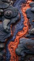 un imagen de lava rocas con naranja y negro colores generativo ai foto