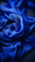 blue satin fabric on black background generative ai photo