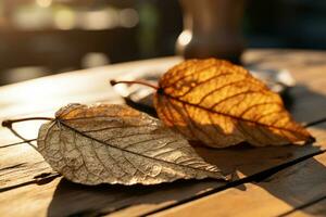two dead leaves on a wooden table generative ai photo