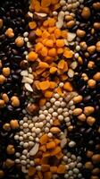 various types of beans nuts and seeds on a black background generative ai photo