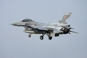 Polish Air Force Lockheed Martin F-16C Fighting Falcon 4071 fighter jet arrival and landing at Leeuwarden Air Base for Frisian Flag 2015 Air Exercise photo