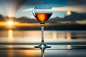 un vaso de vino en un mesa en frente de el puesta de sol. generado por ai foto