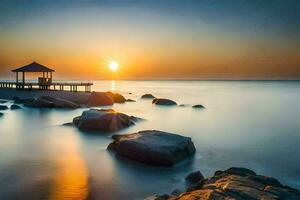 the sun sets over the ocean and rocks. AI-Generated photo