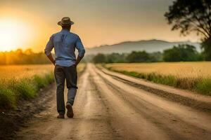 un hombre en un sombrero camina abajo un suciedad la carretera a puesta de sol. generado por ai foto