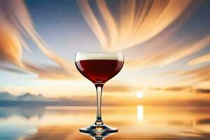 a glass of wine on the beach at sunset. AI-Generated photo