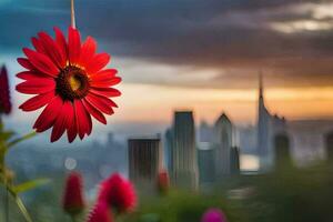 a red flower is hanging from a string in front of a cityscape. AI-Generated photo