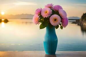 a vase with pink flowers sitting on a table near the water. AI-Generated photo
