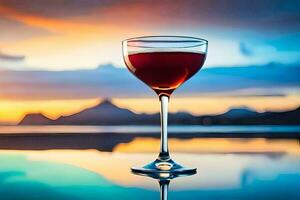 un vaso de rojo vino en un mesa en frente de un puesta de sol. generado por ai foto