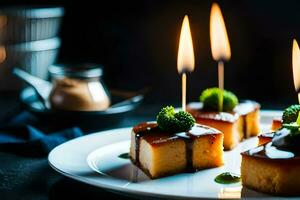 four small squares of cake with candles on them. AI-Generated photo