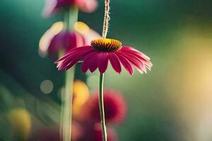 a pink flower with a yellow center is hanging from a string. AI-Generated photo