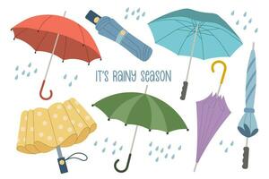Set of rain umbrellas, open and closed umbrellas. Collection of seasonal accessories. Illustration in flat style. Vector