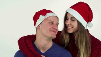Happy Christmas couple hugging and smiling at each other video