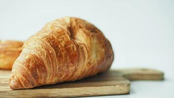 fresh baked croissant on plate with copy space video