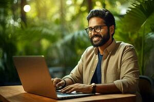 Expertise businessman one smile happy males men ethnicity working technology sitting business indian entrepreneur office person person laptop photo